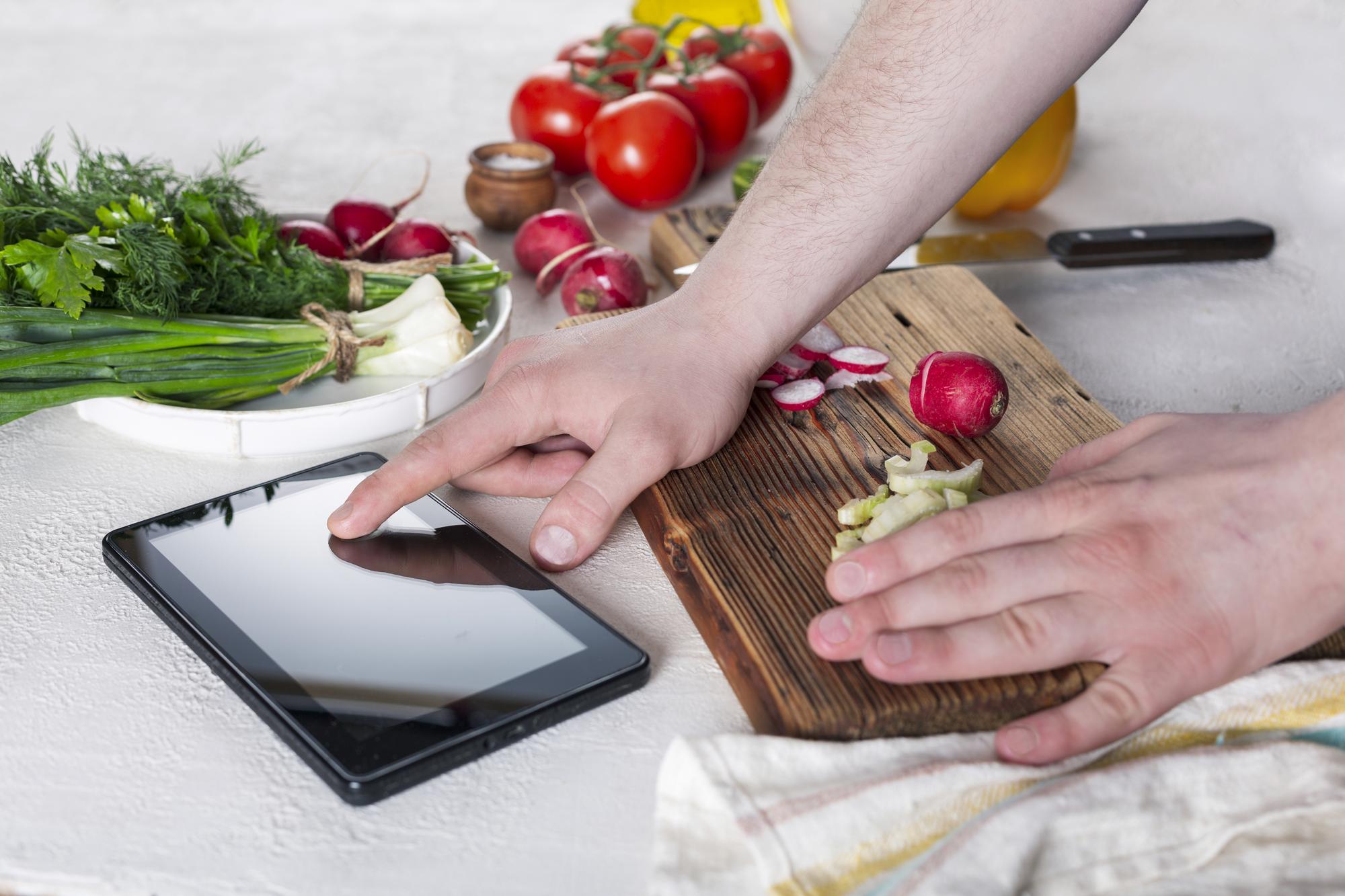 Student chopping vegetables efficiently