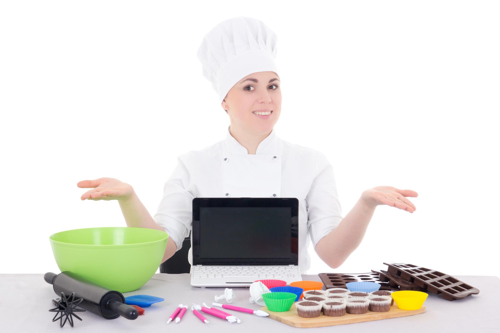 Instructor training a student in compact kitchen